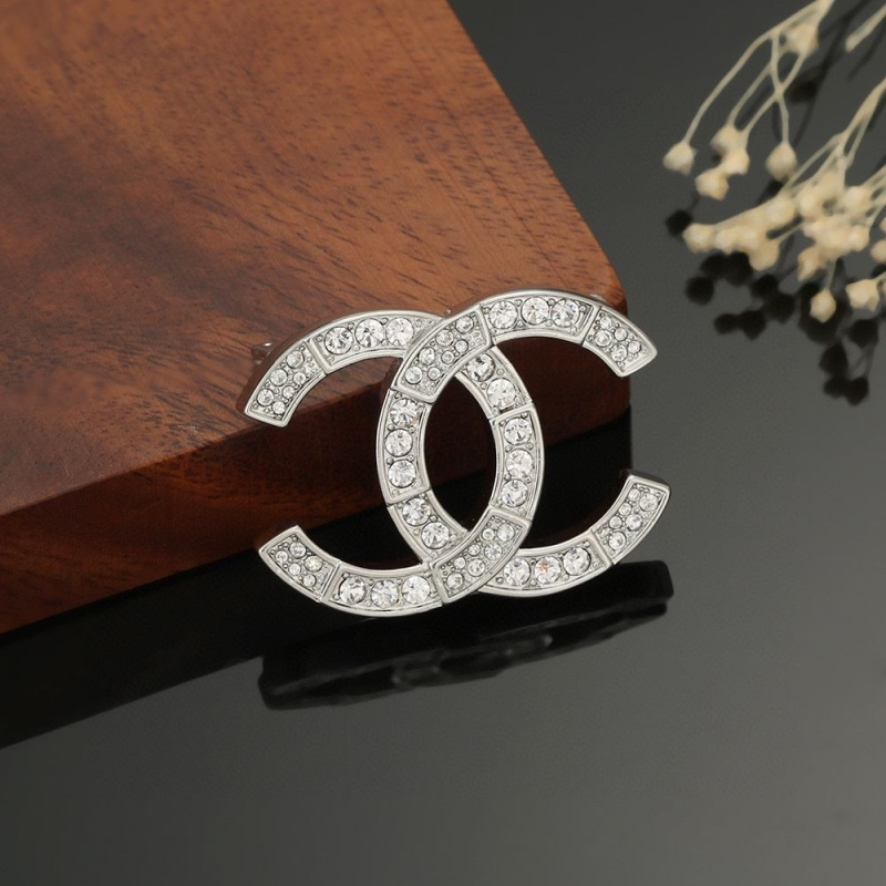 Ch**el brooches